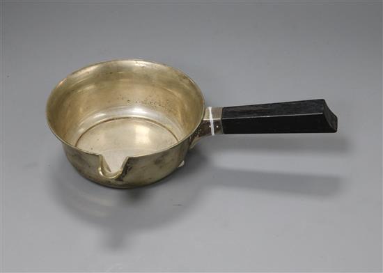 A 1930s Danish white metal brandy pan,